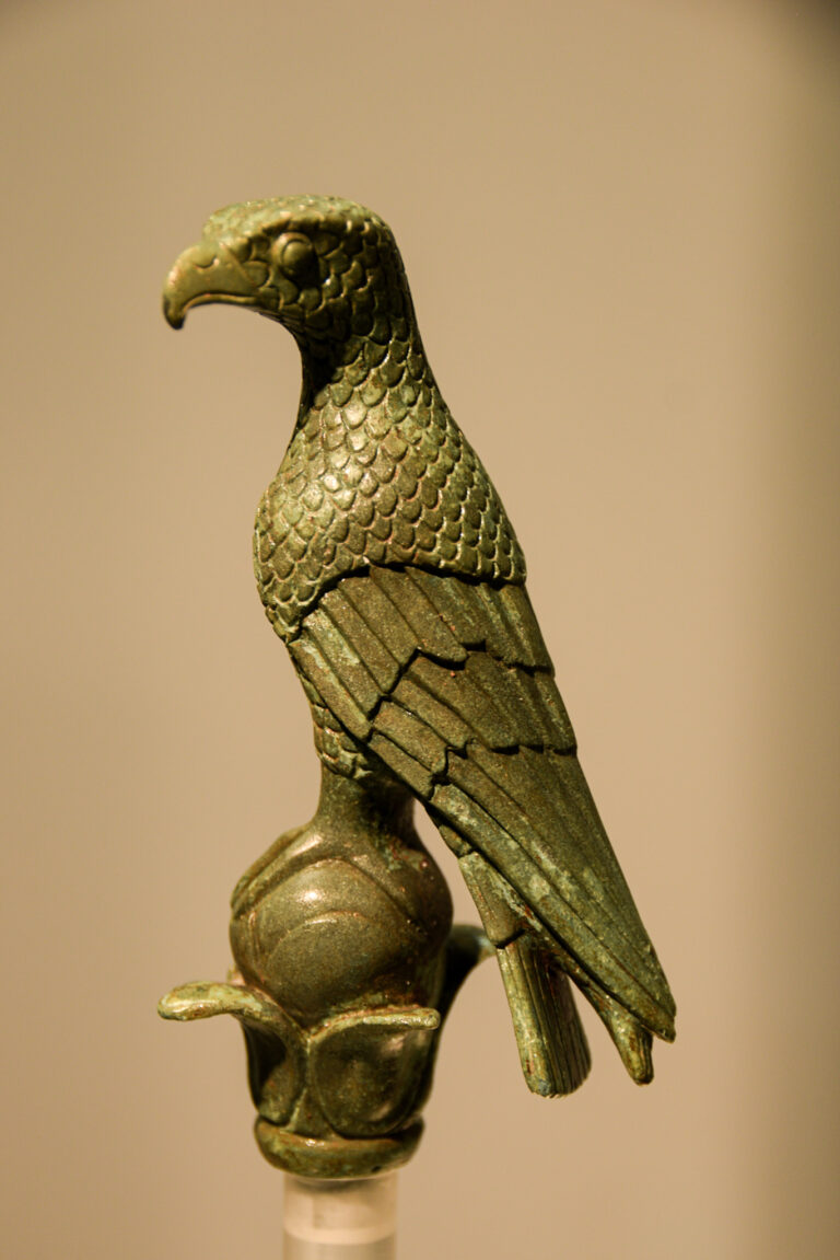 small bronze statue of an eagle