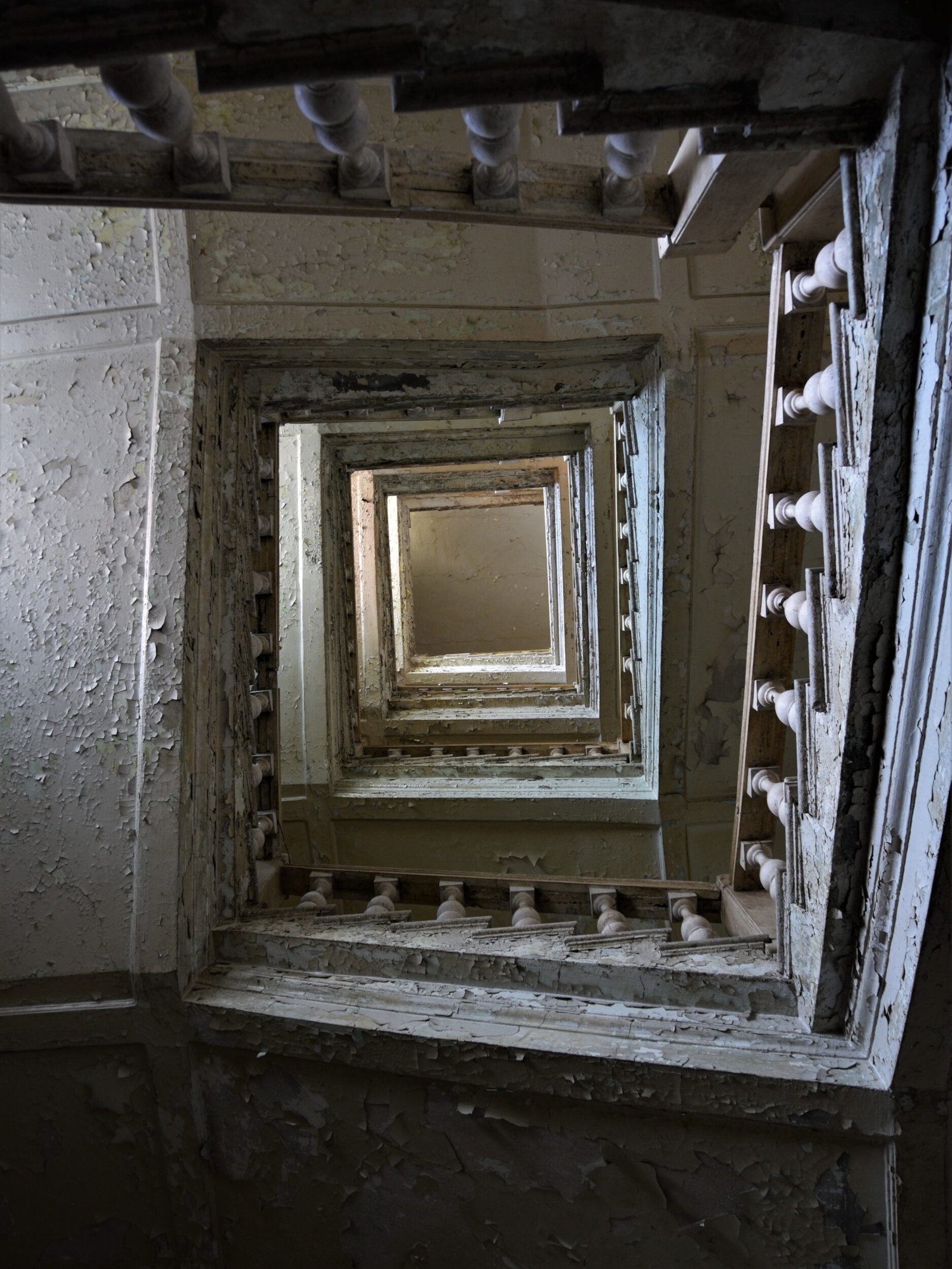 a spiraling staircase seen from below