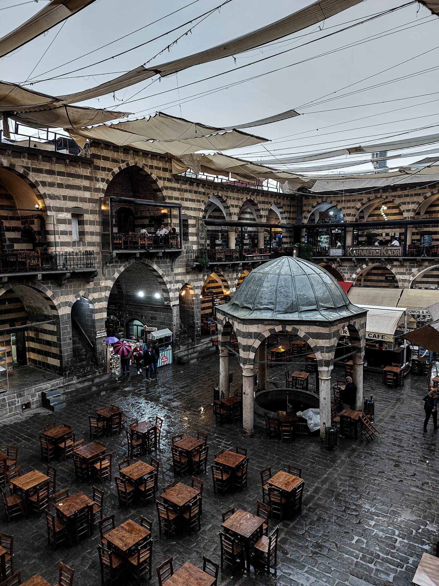 inner courtyard of Hasan Pasa Han after rainfall in Diyarbakir