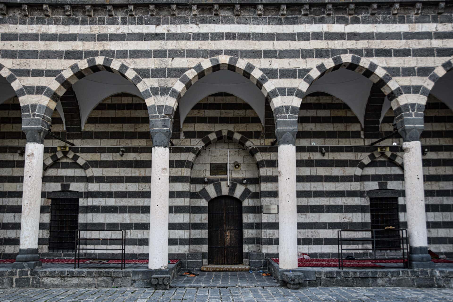 white and black striped facade of Ali Pasa mosque in Diyarbakir