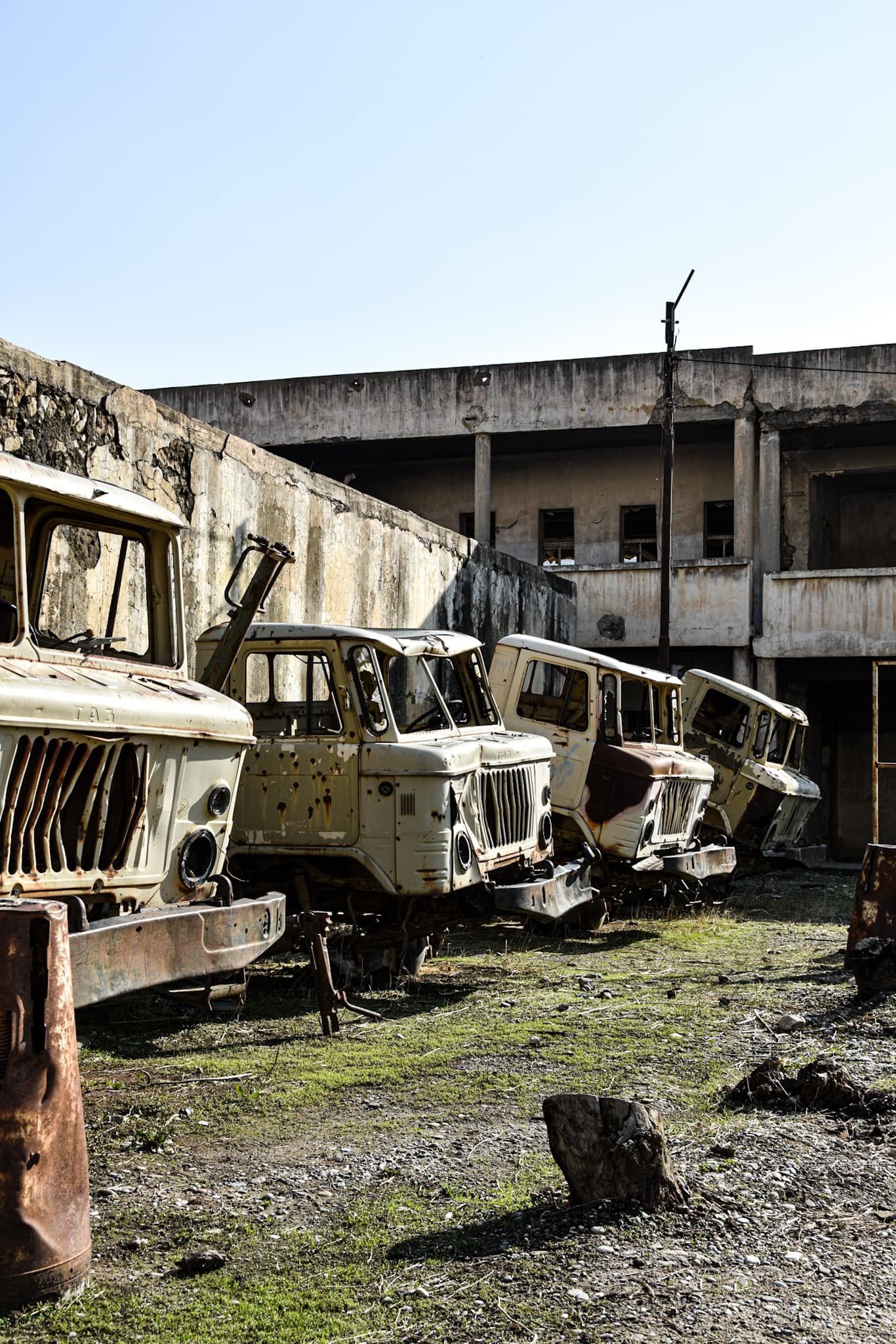 old Soviet military trucks in an abandoned Iraqi prison