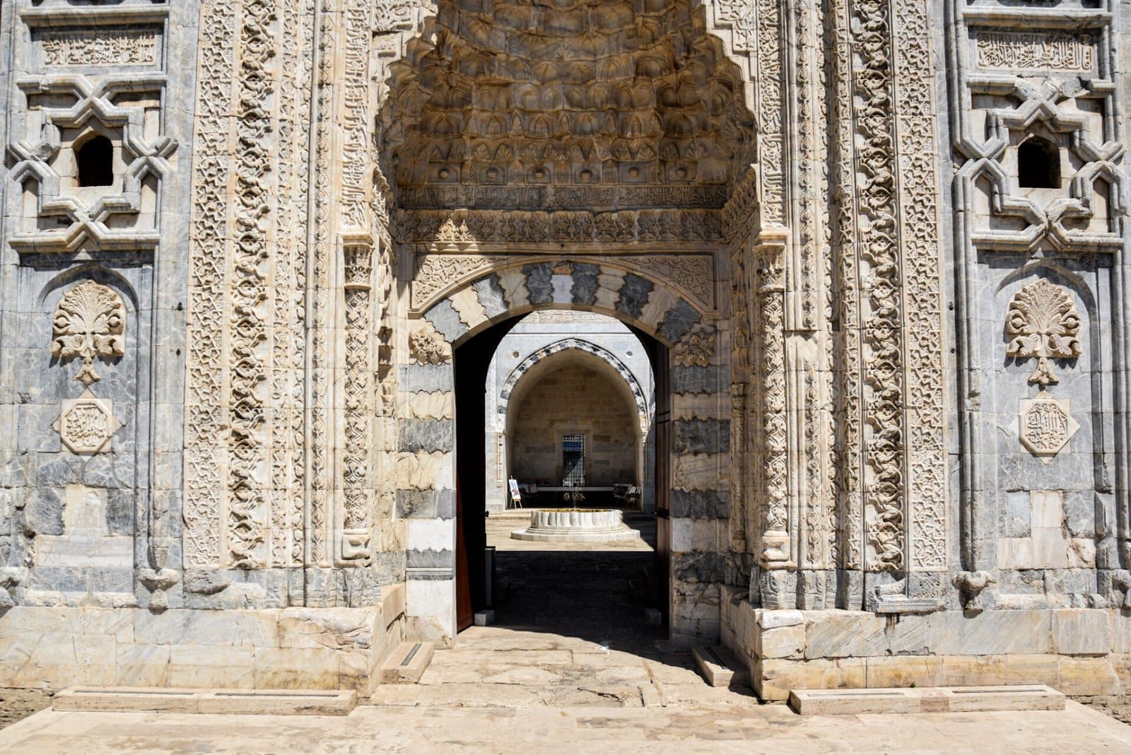 beautifully carved entrance gate of a Seljuk-era madrasa