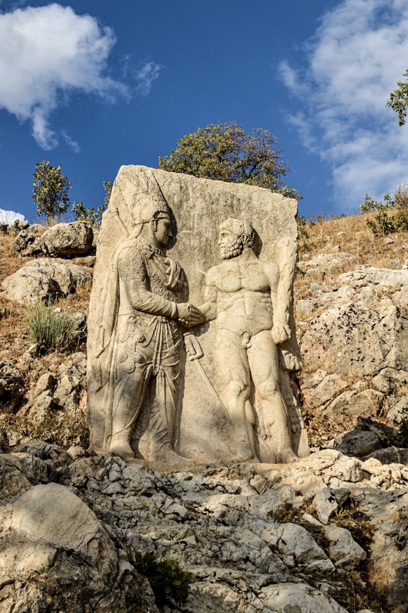 stone stele depictig King Mithridates I of Commagene shaking hands with legendary hero Heracles
